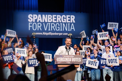 Pete Buttigieg on stage with supporters