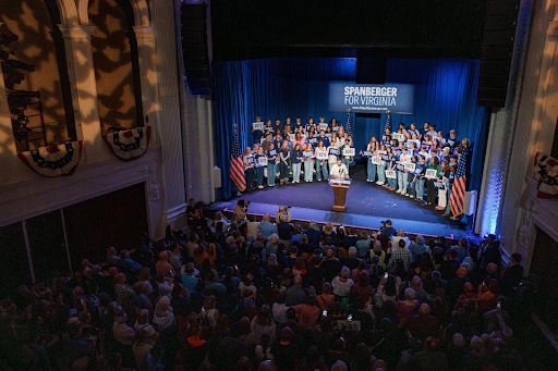 Pete Buttigieg on stage with supporters